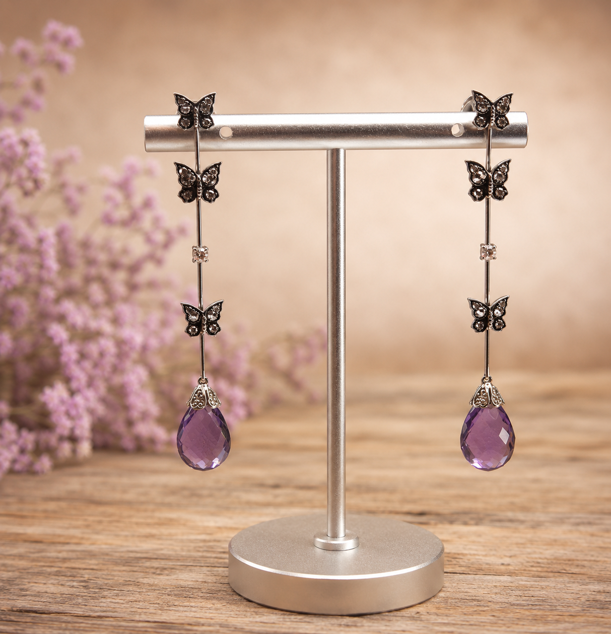 Aros amatista briolette y mariposas