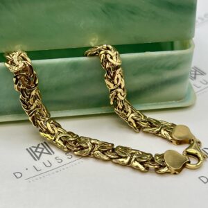 Pulsera de oro nudos