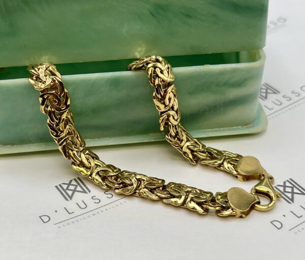 Pulsera de oro nudos