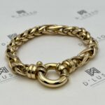 Pulsera oro trenza broche timón