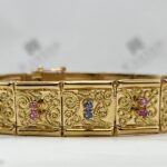 Brazalete articulado zafiros y rubíes