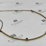 Collar de oro con esmeraldas redondas