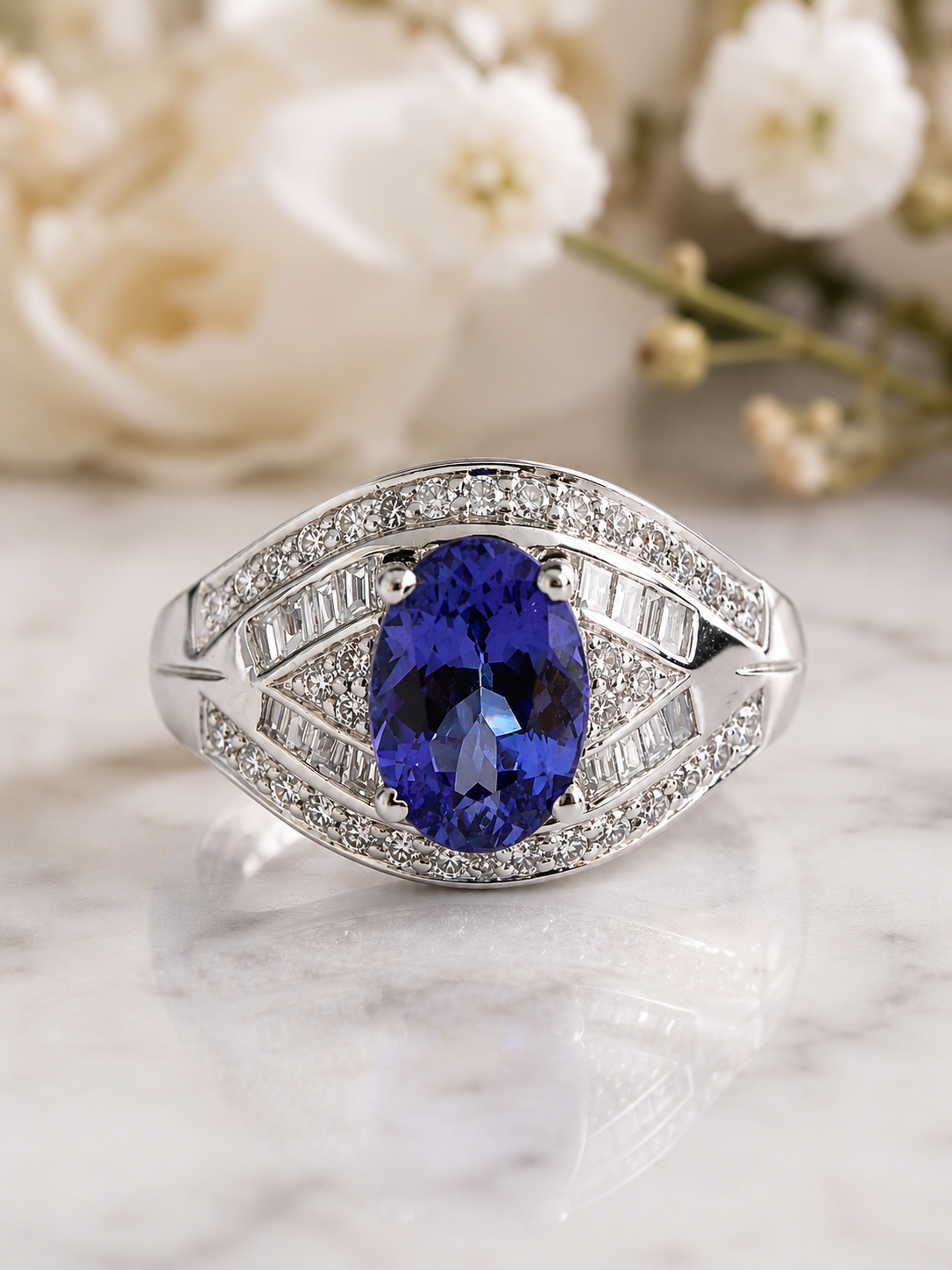 Anillo domo tanzanita brillantes y baguettes
